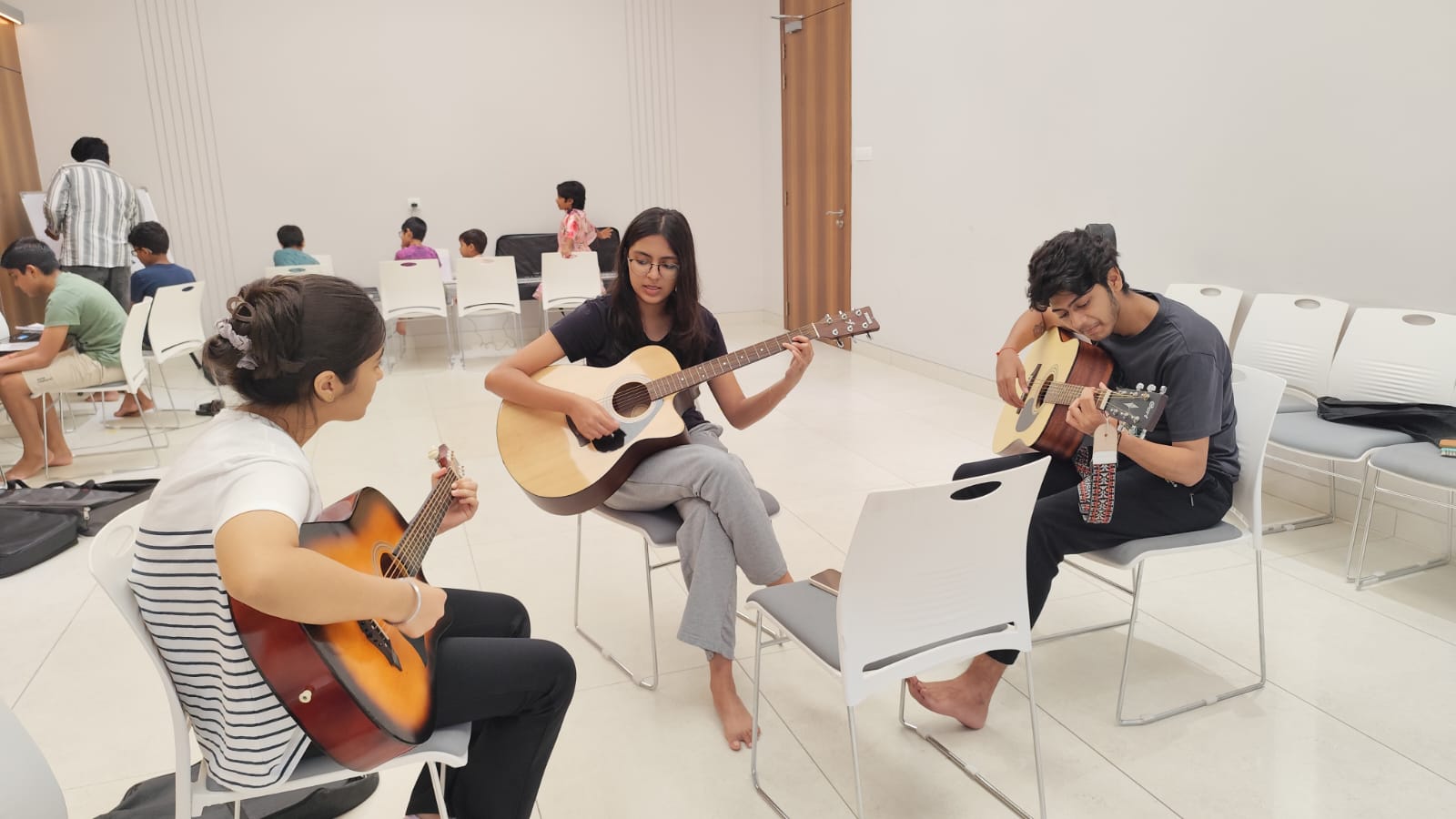 Bharatanatyam dancers in ornate frame with Nataraja